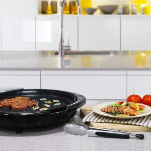 Elite Gourmet 14-inch smokeless electric grill with nonstick surface, ideal for indoor tabletop BBQ cooking.