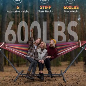 Cozy double hammock setup with steel stand in backyard—portable comfort solution for relaxing solo or with a partner.
