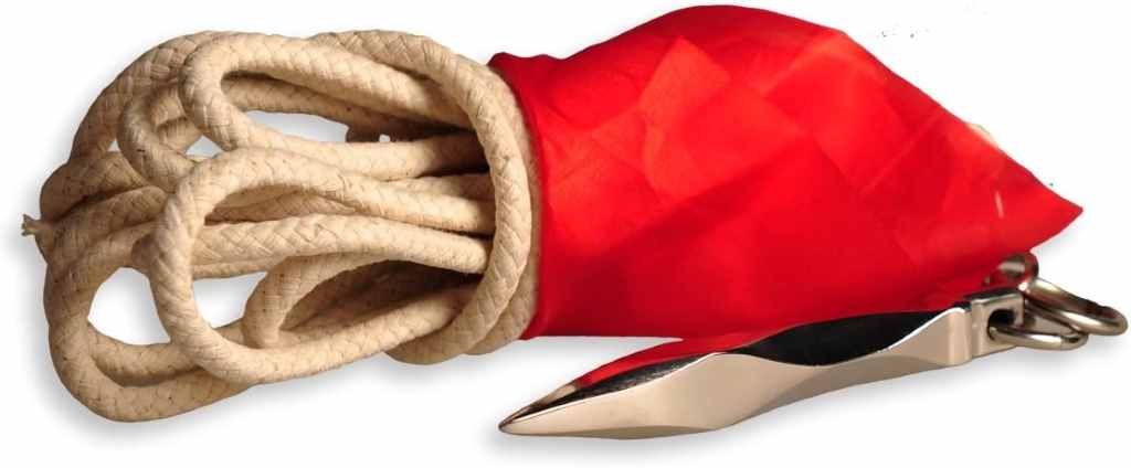 ICNBUYS rope dart coiled neatly beside training gear, showcasing stainless steel tip, durable rope, and vibrant flag.