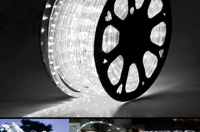 Creative patio setup with Jnaurb 100ft LED rope lights outlining garden edges in waterproof, color-shifting brilliance.