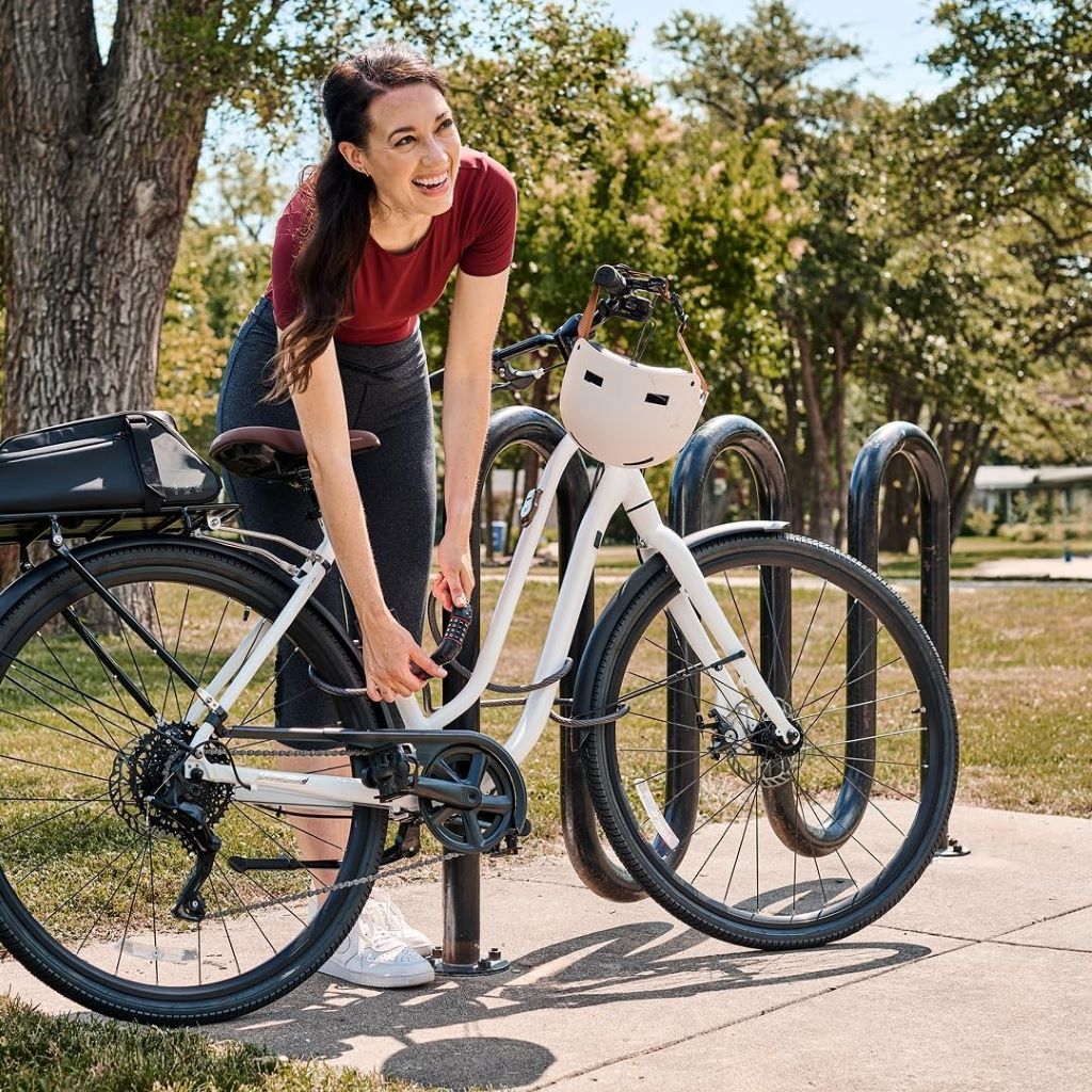 Master Lock 6ft black combination cable bike lock coiled neatly, showcasing durable design and easy-to-use locking mechanism.