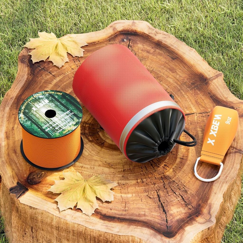 Arborist using the XBEN Throw Line Kit to rig high and low tree limbs safely with durable rope and weighted throw bags.