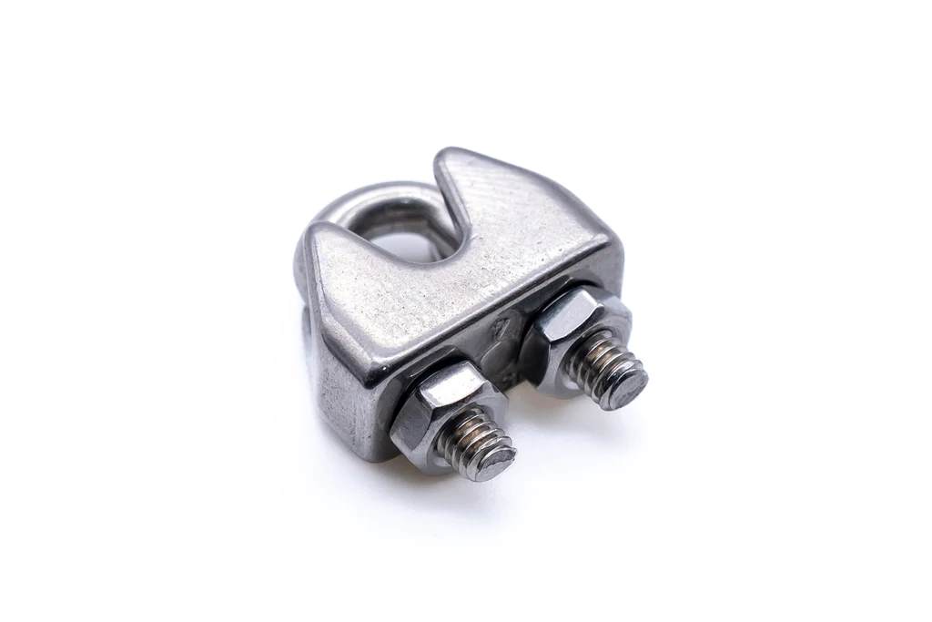 A set of stainless steel U-bolt rope clamps on a white background