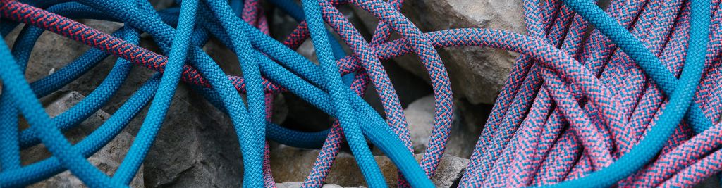 Close-up of a rope with hidden internal damage beneath the surface fibers.