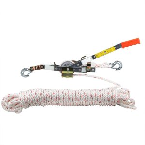 Worker inspecting and maintaining a heavy-duty rope used for pulling tasks.