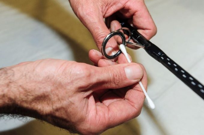 Close-up of fishing ropes being cleaned, stored, and inspected for durability.