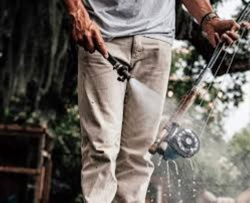 Fisherman maintaining fishing ropes: cleaning, organizing, and checking for wear.