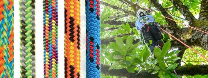 Climber using kernmantle rope secured to rock climbing harness for safety.