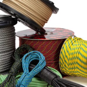 Worker selecting synthetic rope for industrial or off-road heavy-duty applications