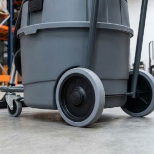 Commercial vacuum cleaner cleaning office carpet
