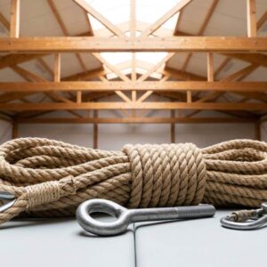 Installing a gymnastics climbing rope on a garage ceiling beam